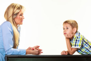 How do I tell an Oklahoma judge in my child custody case that there is parental coaching going on lawyer?